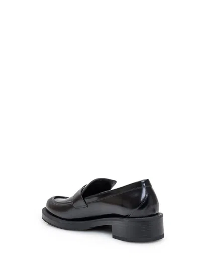 Shop Stuart Weitzman Palmer Bold Moccasin In Black