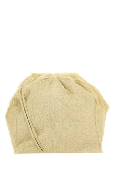 Jil Sander Fur Drawstring-fastening Shoulder Bag In Light Yellow