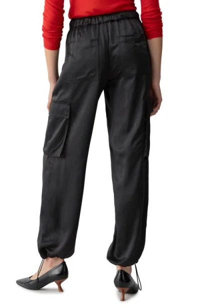 Shop Sanctuary Satin Cargo Parachute Pants In Black