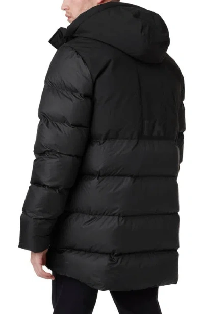 Shop Helly Hansen Active Puffy Long Jacket In Black