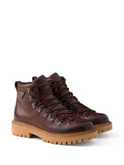 Prada Triangle-enamel Boots In Brown