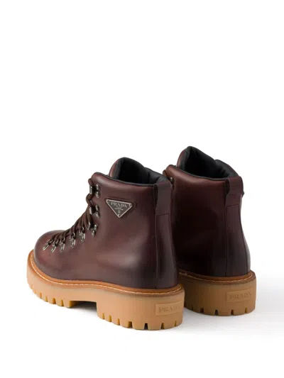Prada Triangle-enamel Boots In Brown