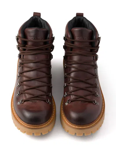 Prada Triangle-enamel Boots In Brown