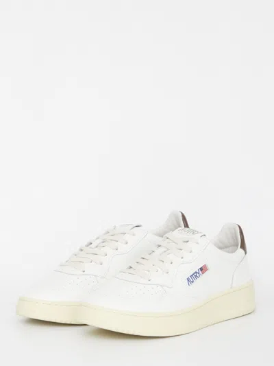 Shop Autry Medalist White And Brown Sneakers In Marrone