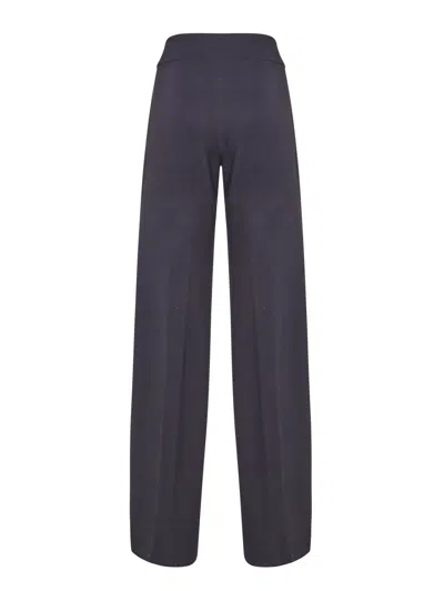 Shop Genny Palazzo Trousers In Black