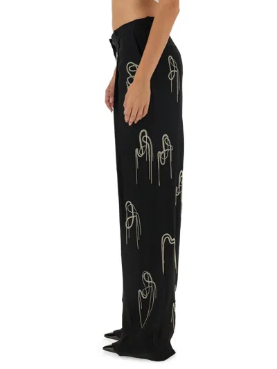 Shop Dries Van Noten Wide Leg Pants In Black