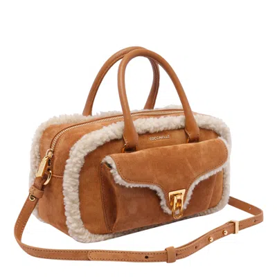 Shop Coccinelle Beat Handbag In Natural/cuir