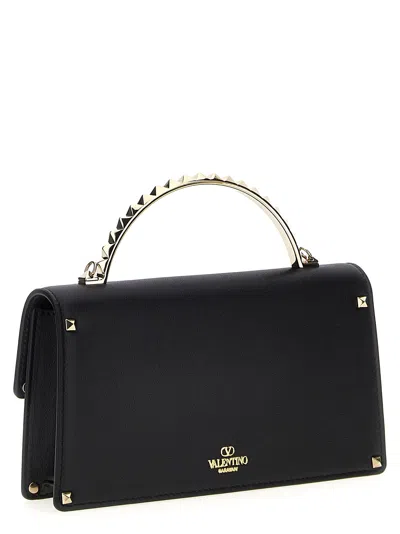 Shop Valentino Garavani Rockstud Mini Handbag In Black