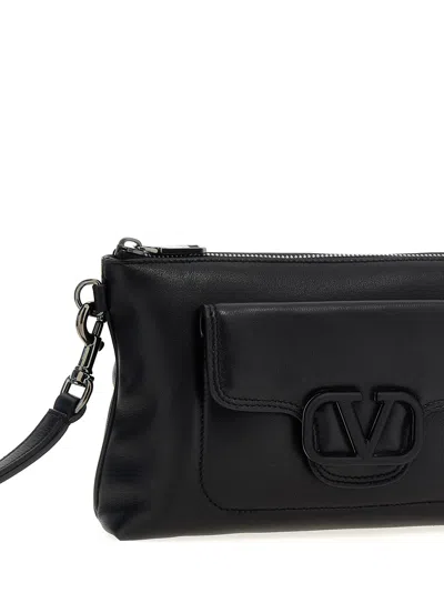 Shop Valentino Garavani Vlogo Signature Clutch Bag In Black