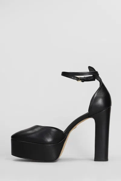 Shop Carrano Pumps In Black