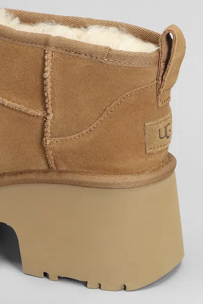 Ugg Brown 'ultra Mini New Heights' Boots In Leather Color
