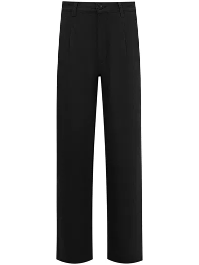 Shop Noah Ny Double-pleat Cotton Trousers In Black