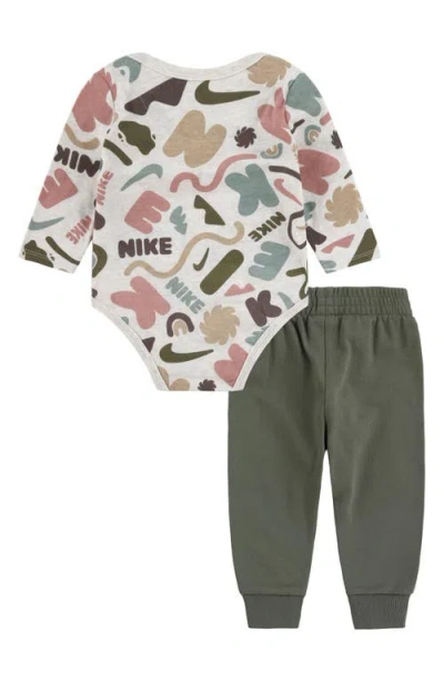 Nike Swoosh Print Bodysuit & Sweatpants Set In Medium Olive