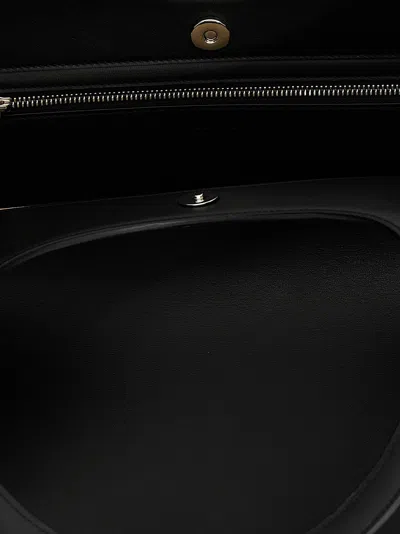 Courrèges Maxi Holy Hand Bags Black