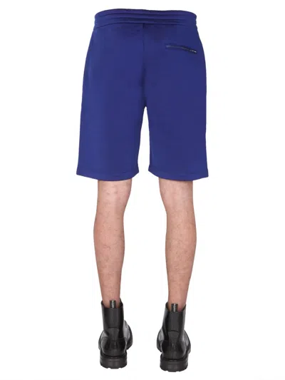 Alexander Mcqueen Men's Shorts With Embroidered Logo In Blue