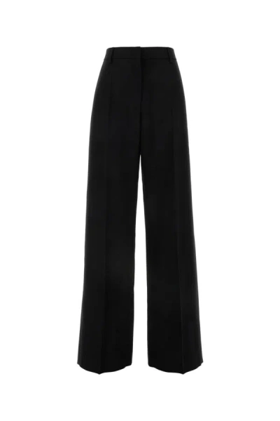 Valentino Virgin Wool Wide-leg Tailored Trousers In Black