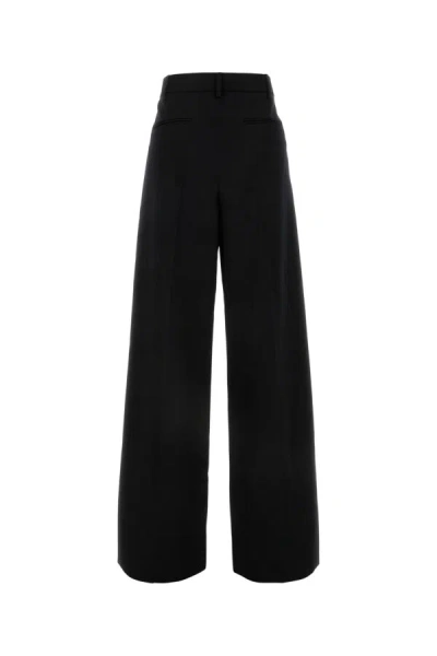 Valentino Virgin Wool Wide-leg Tailored Trousers In Black