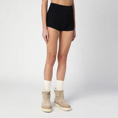 Essentials Embossed Logo Knit Shorts In Black