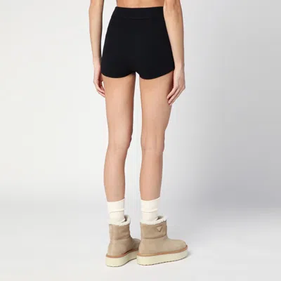Essentials Embossed Logo Knit Shorts In Black