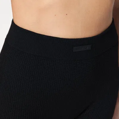 Essentials Embossed Logo Knit Shorts In Black