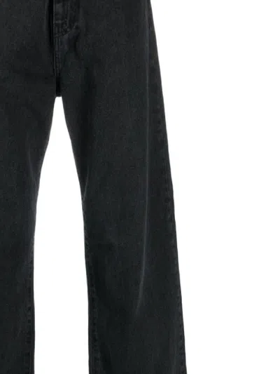 Shop Carhartt Wip Jeans In Black Stone Washed
