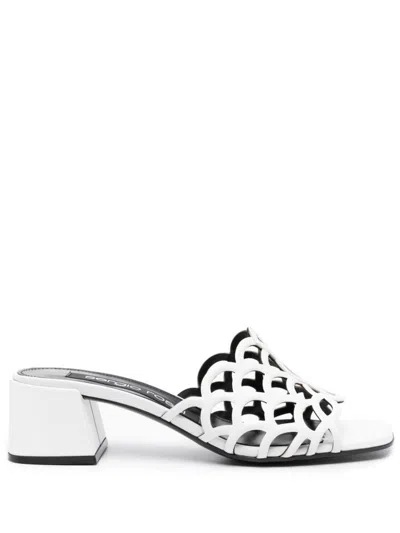 Sergio Rossi Low Block Heel Mules With Openwork Detail In White