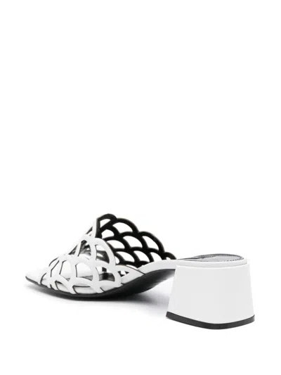 Sergio Rossi Low Block Heel Mules With Openwork Detail In White