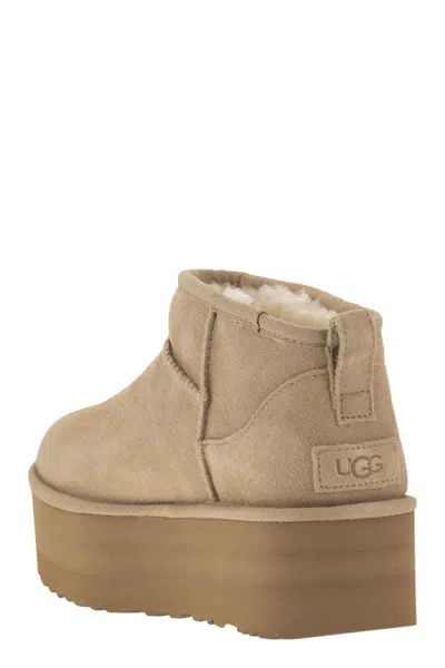 Shop Ugg Ultra Mini Classic - Boots With Plateau In Beige