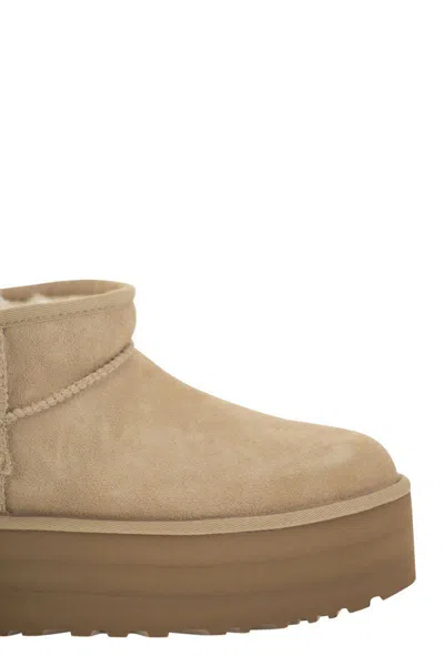 Shop Ugg Ultra Mini Classic - Boots With Plateau In Beige