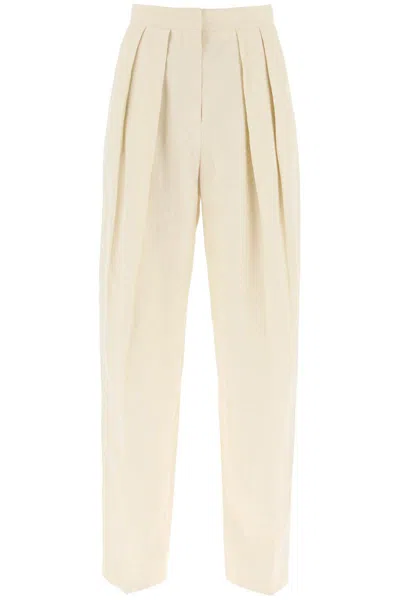 Shop Stella Mccartney Loose Linen Blend Pants With Front Pleats In Beige