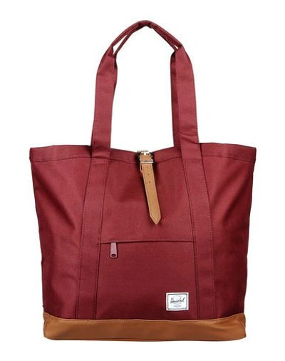 Herschel Supply Co. Handbags In Maroon