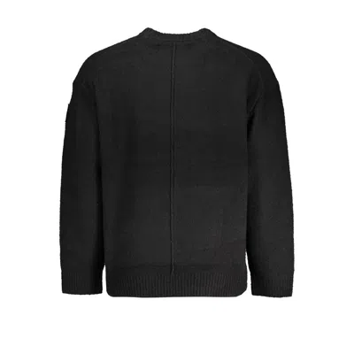 Calvin Klein Sleek Long Sleeved Crew Neck Sweater In Black