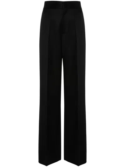 Shop Moschino Trousers In Black