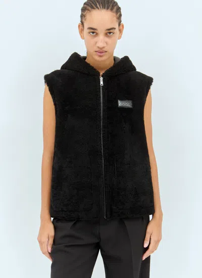 Gucci Reversible Shearling Vest In Black
