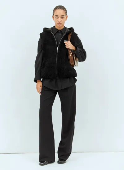 Gucci Reversible Shearling Vest In Black