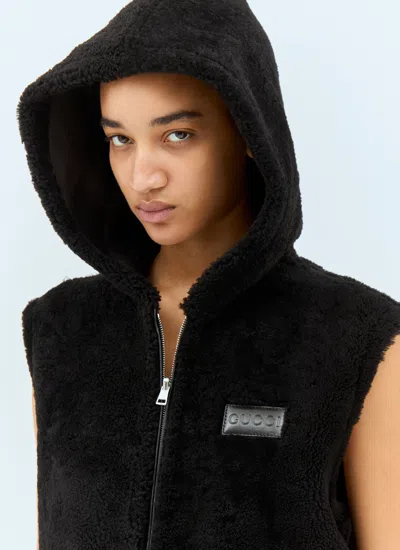 Gucci Reversible Shearling Vest In Black