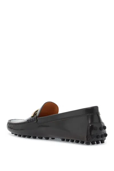 Tod's Loafers With Golden Detail And Gommino Sole In Brown