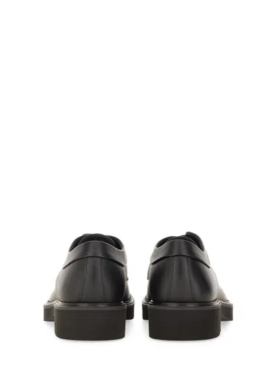 Ferragamo Logo-debossed Leather Derby Shoes In Black