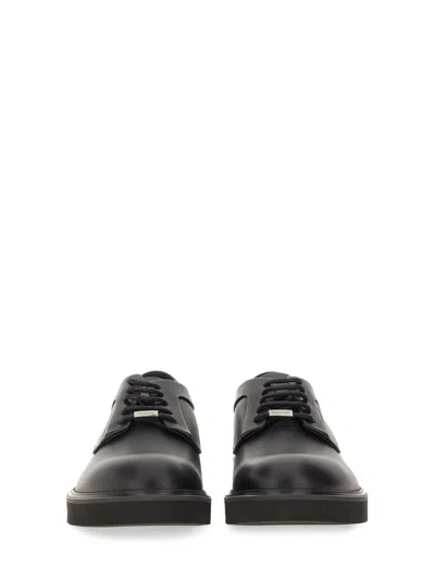 Ferragamo Logo-debossed Leather Derby Shoes In Black