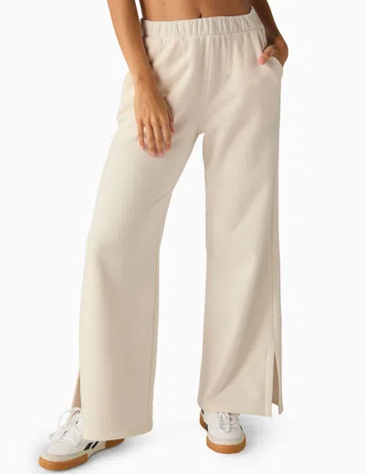 BEYOND YOGA OPEN ENDED MID RISE WIDE LEG PANT 
