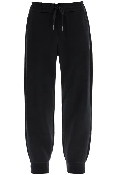 Shop Hugo Boss Pantaloni Jogger Con Patch Doppio Monogramma In Black