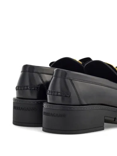 Ferragamo Gancini Buckle Loafers In Black