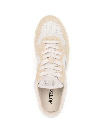 Autry Low Top Sneakers In Calf Leather In Neutral