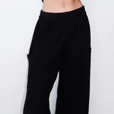 Monrow Supersoft Sweater Knit Flare Pants In Black