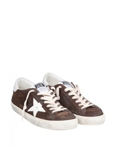 Shop Golden Goose Suede Sneakers