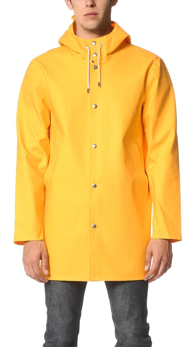 Shop Stutterheim Stockholm Raincoat In Yellow