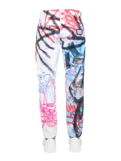 Dolce & Gabbana Spray-paint Graffiti Print Loose Jeans In Multicolor