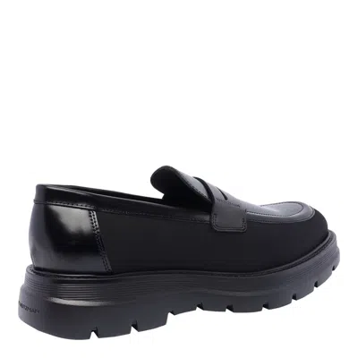 Stuart Weitzman Sculpted Rubber Sole Moccasin With Elastic Inserts In Black