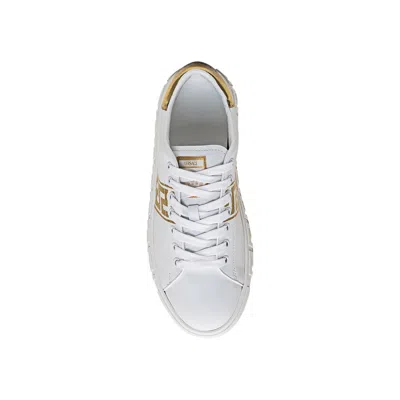 Shop Versace Greca Leather Sneakers In White