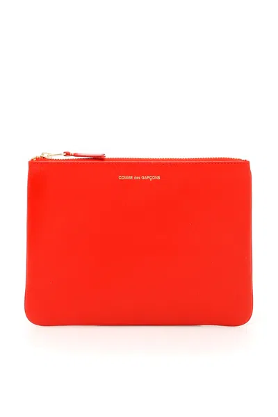 COMME DES GARÇONS COMME DES GARÇONS WALLET SMOOTH LEATHER POUCH IN SEVEN WORDS 